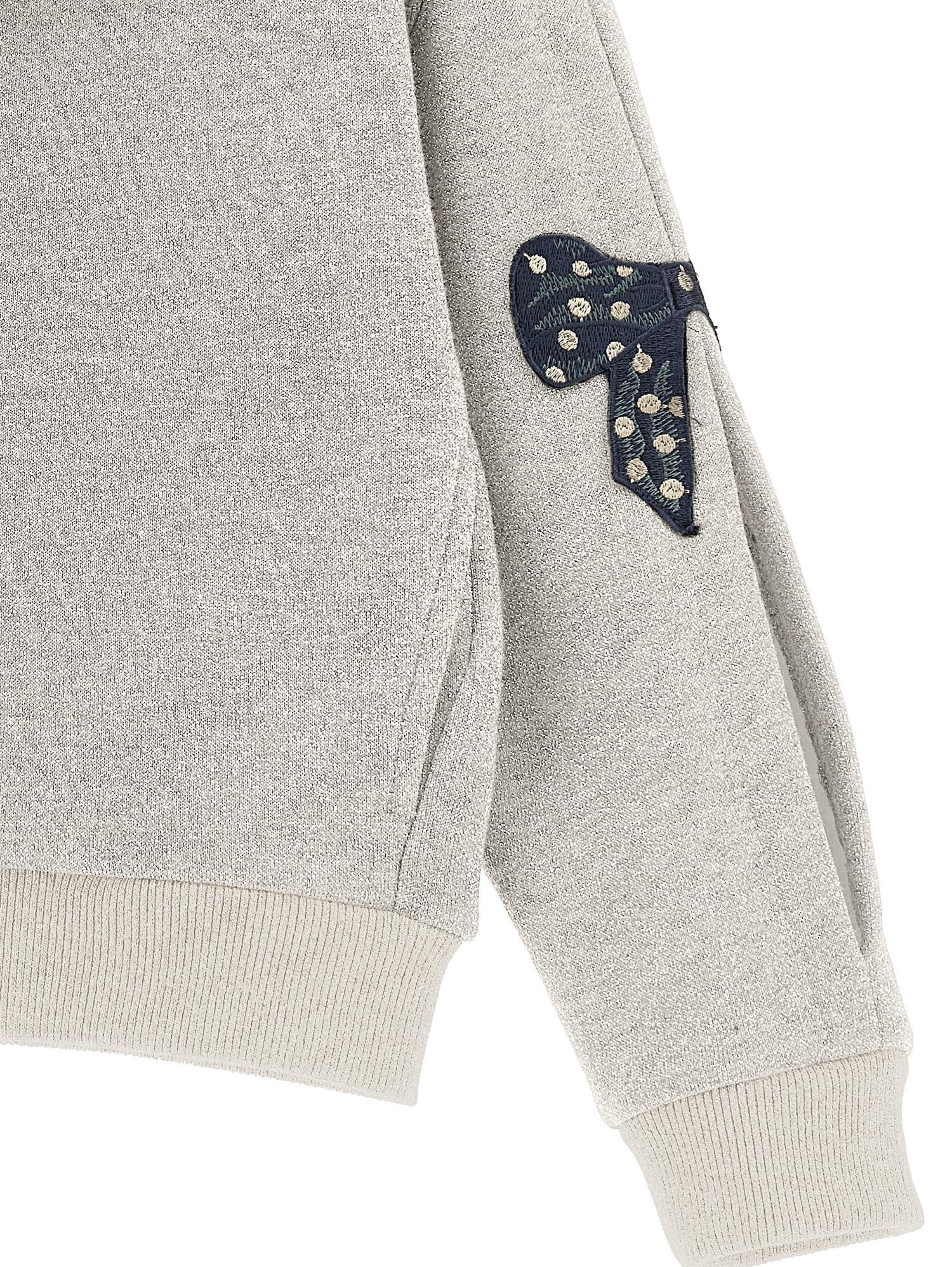 Felpa lurex con fiocchi