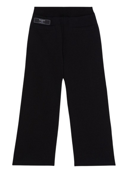 Pantaloni con bottoni