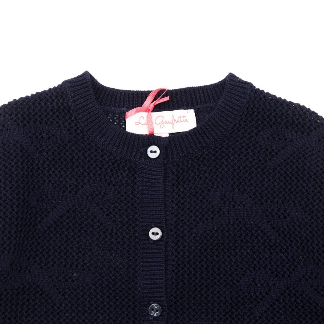 Cardigan neonata forato