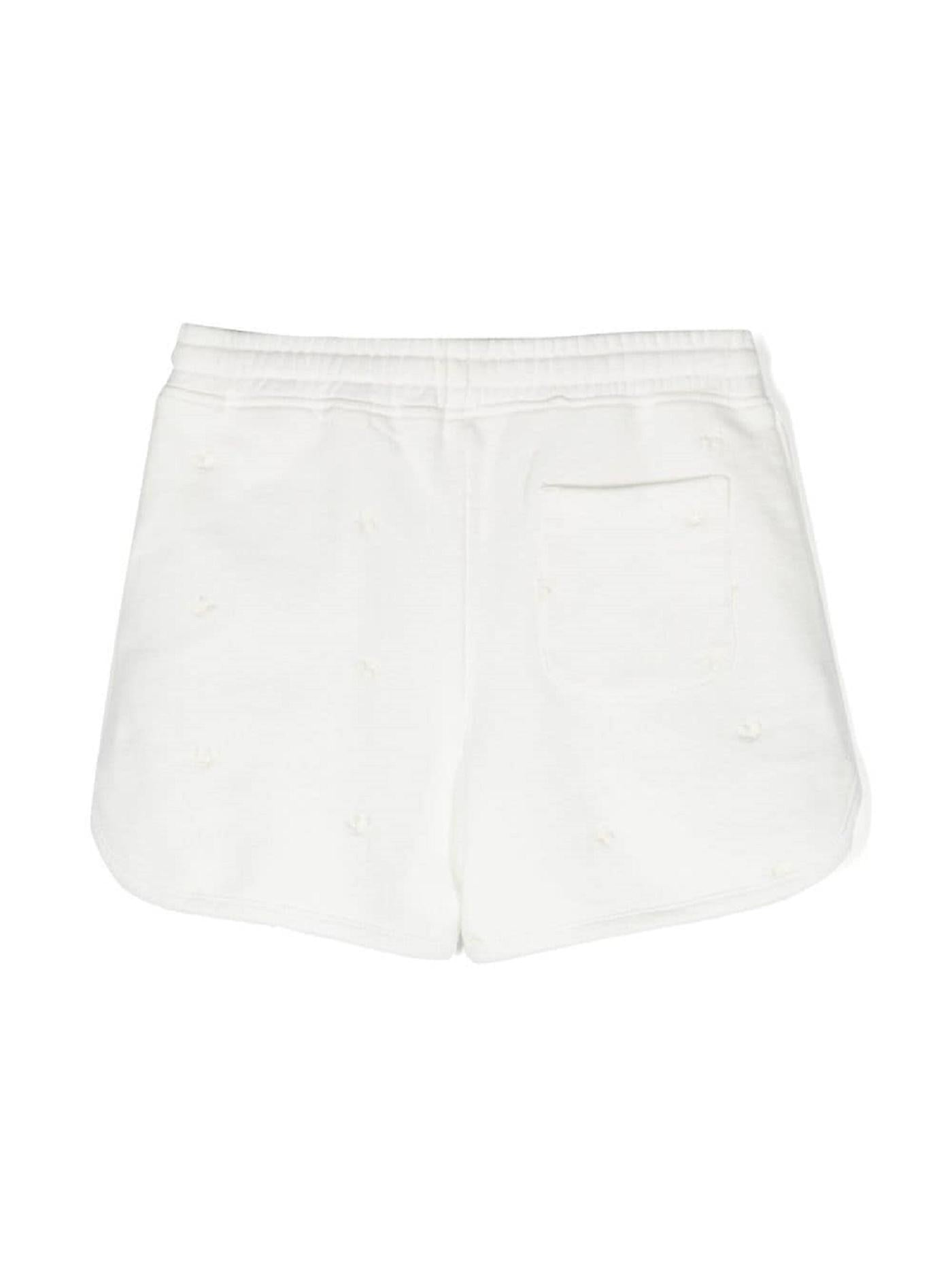 Shorts con ricamo
