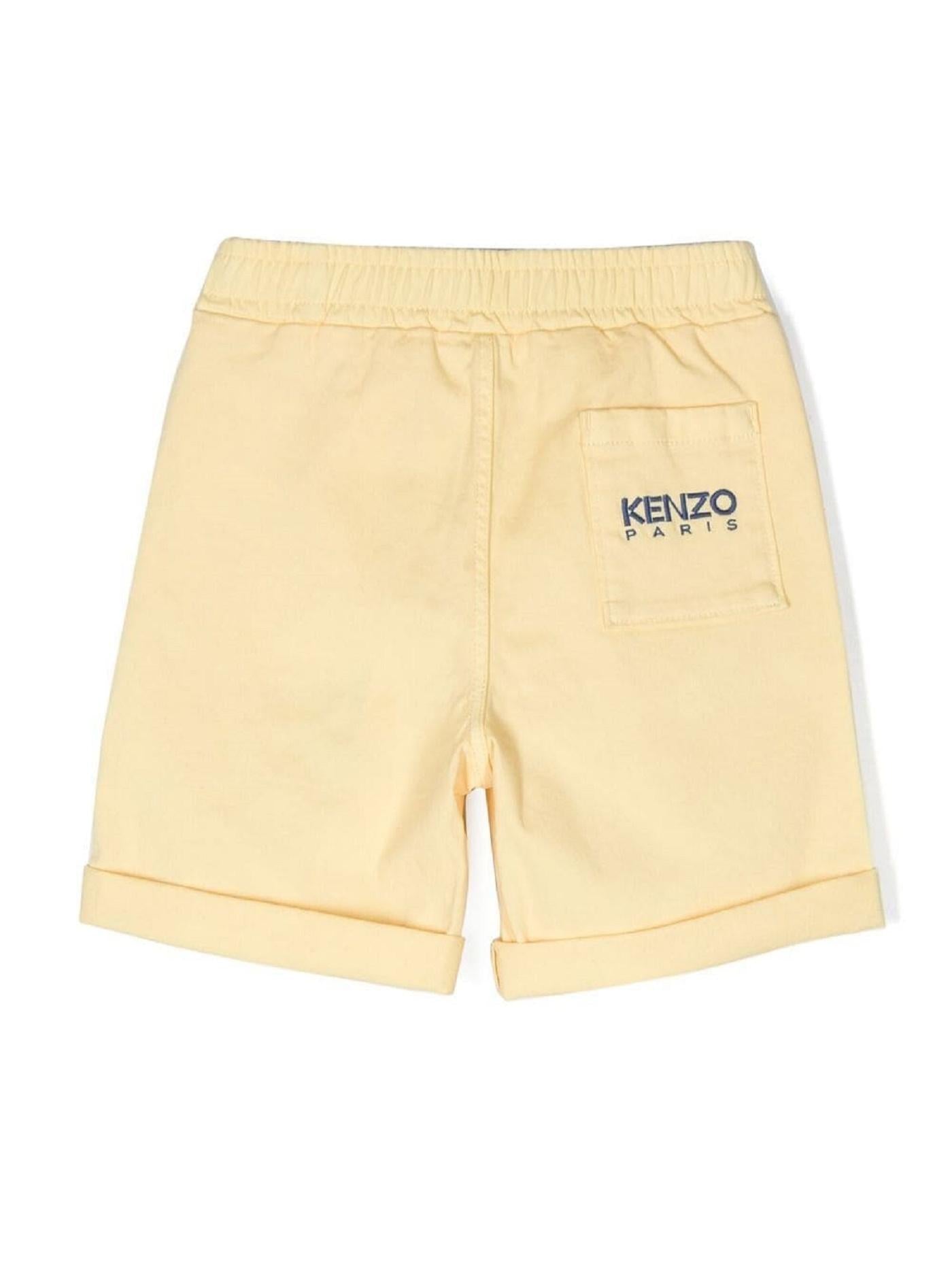 Shorts con ricami