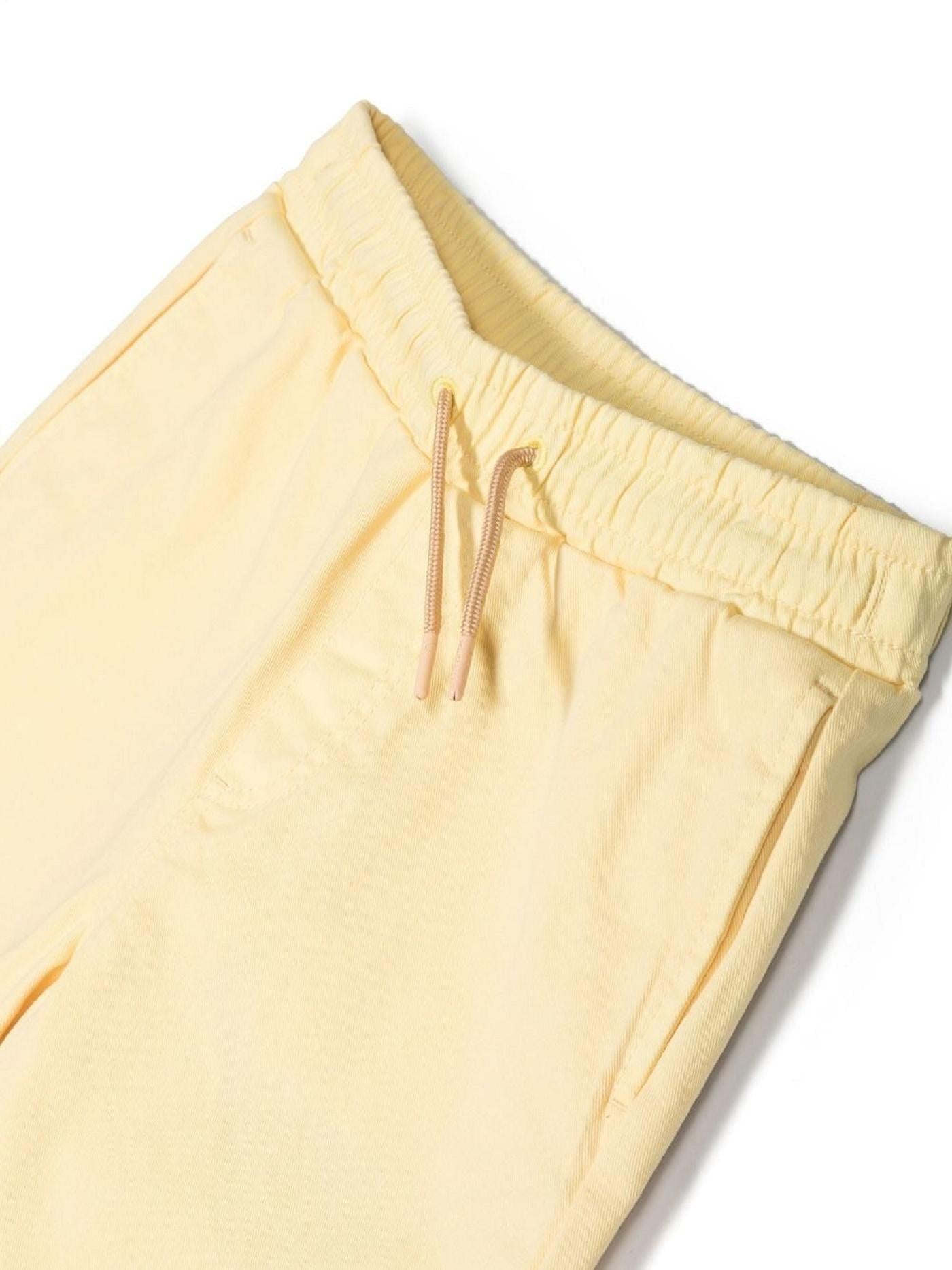 Shorts con ricami