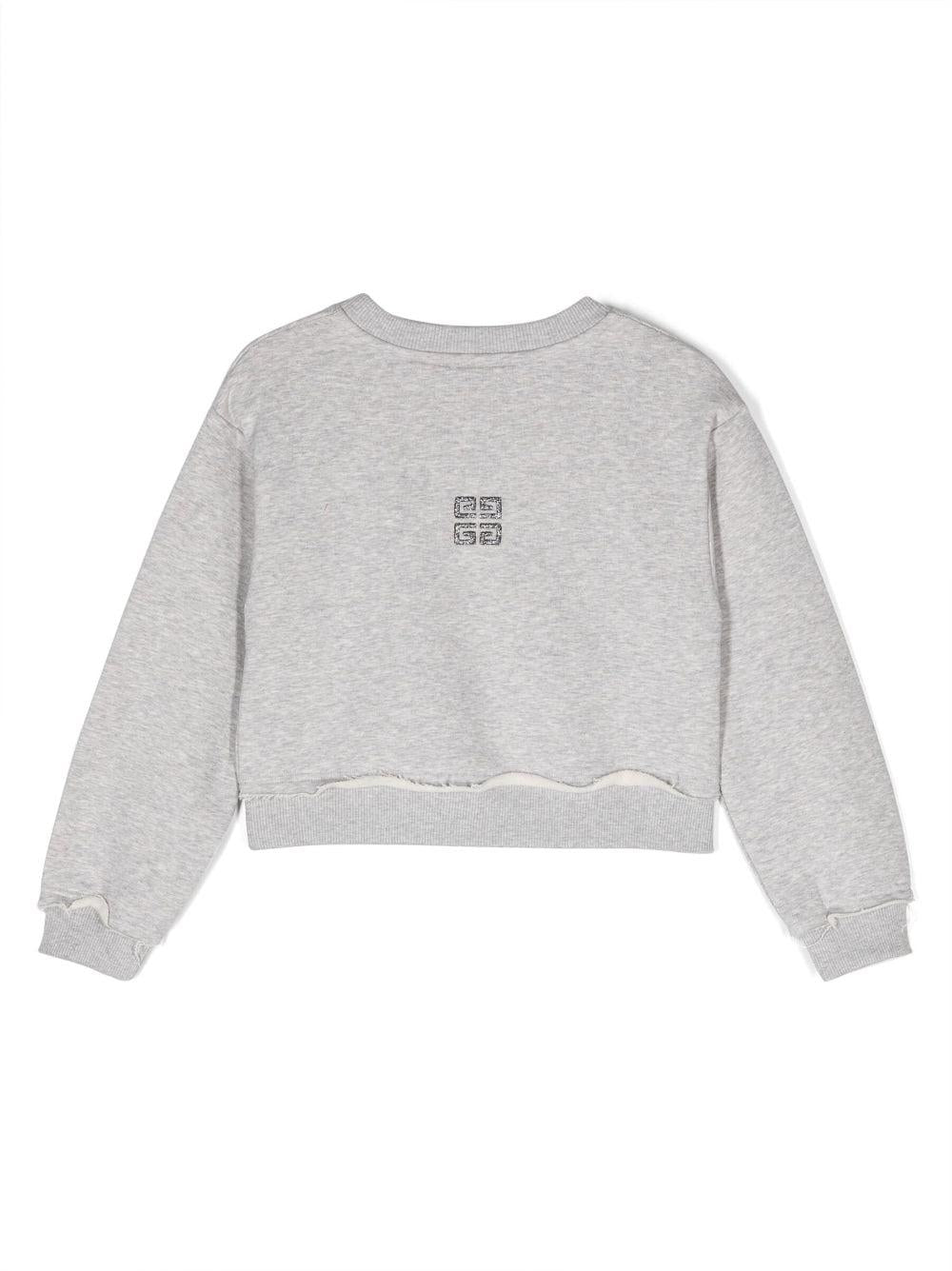 Felpa crop con ricamo
