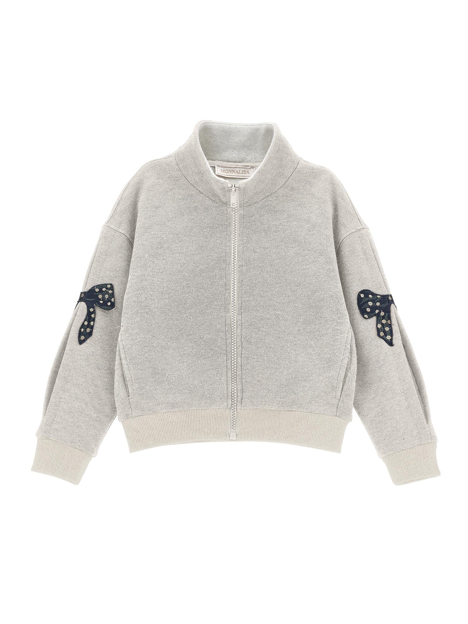 Felpa lurex con fiocchi