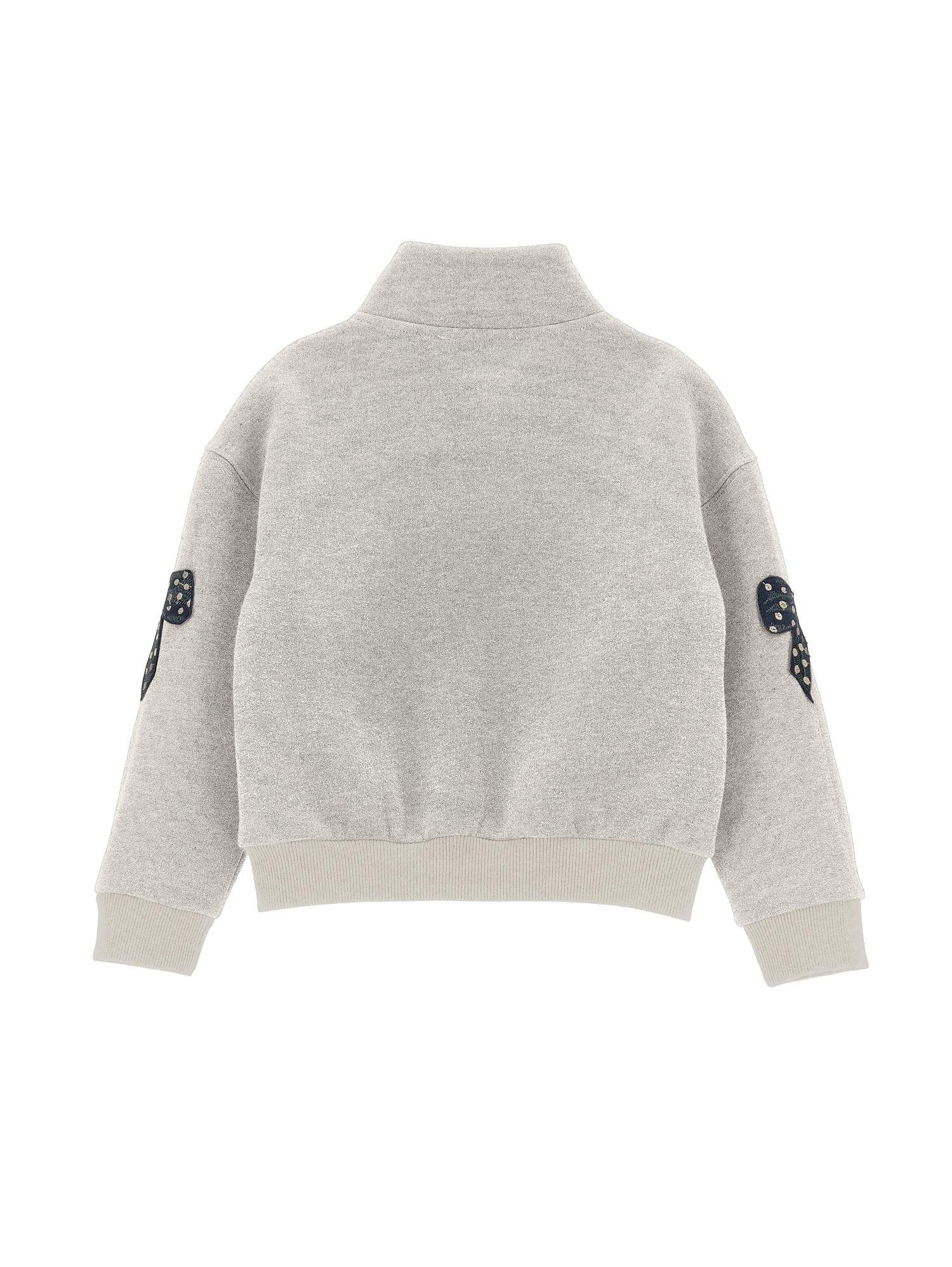 Felpa lurex con fiocchi