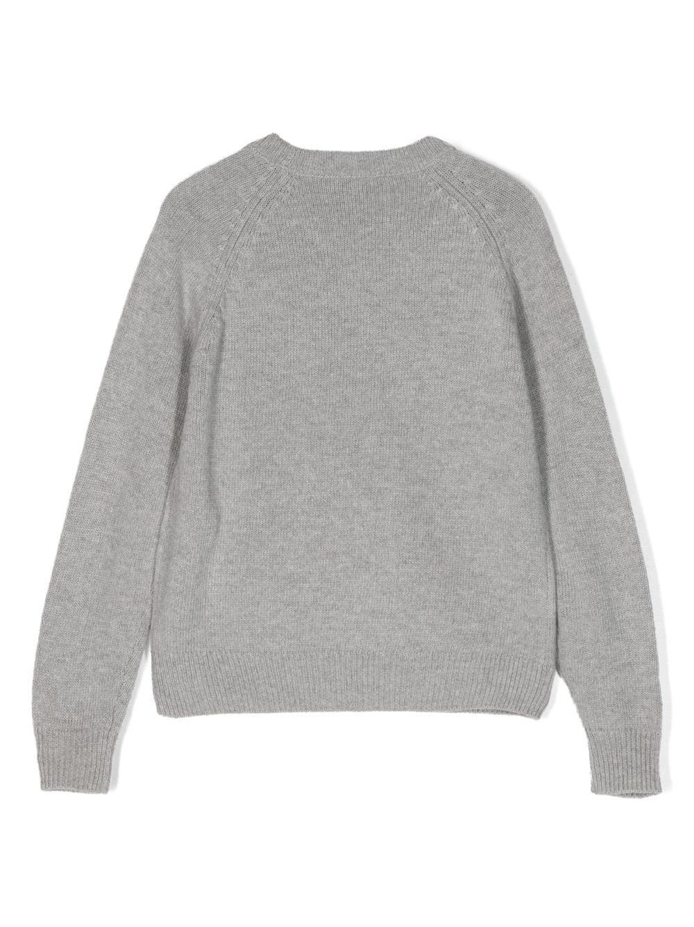 Maglione con appplicazione